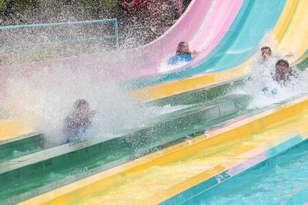 Orlando, Florida. July 01, 2019. Person enjoying amazing splashing in Tamauta Racer attraction at Aquatica 8のeditorial素材