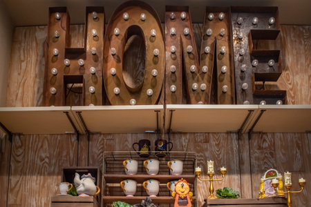 Orlando, Florida. June 15, 2019. Artisan home sign, and Beauty and the Beast decoration in Disney...