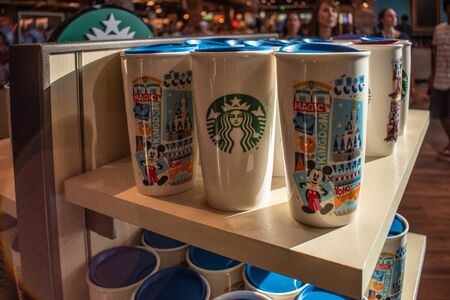 Orlando, Florida. June 15, 2019. Disney Starbucks Mugs in Disney Springs at Lake Buena Vista.のeditorial素材