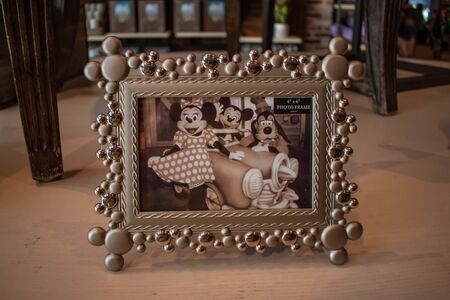 Orlando, Florida. June 15, 2019. Vintage picture of Mickey, Minnie and Goofy in Disney Springs at Lake Buena Vista.のeditorial素材