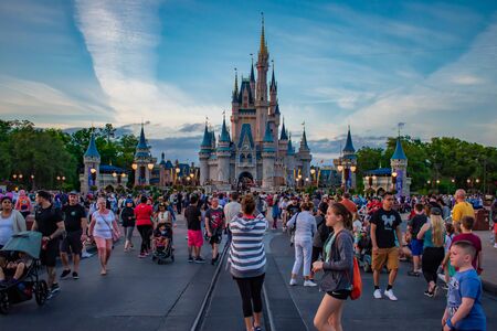Orlando, Florida. June 03. 2019. People walking to Cinderella Castle in Main Street at Magic Kingdom.のeditorial素材