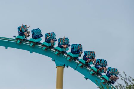 Orlando, Florida. June 17, 2019. People having fun amazing Kraken rollercoaster at Seaworld 7のeditorial素材