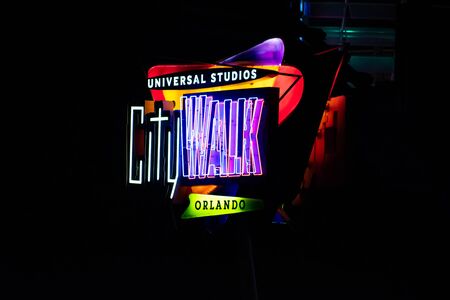 Orlando, Florida. June 13, 2019. Top view of Universal Studios CityWalk sign on dark night background at Universal Studios area.のeditorial素材