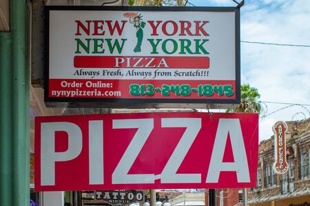 Tampa Bay, Florida. July 12, 2019 New York Pizza sign at Ybor City.のeditorial素材