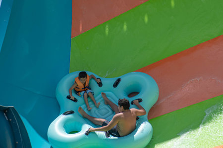 Orlando, Florida. July 29, 2019. People enjoying Kare Kare curl water attraction at Aquatica 6