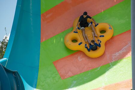 Orlando, Florida. July 29, 2019. People enjoying Kare Kare curl water attraction at Aquatica 11のeditorial素材