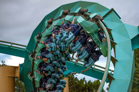Orlando, Florida. July 25, 2019. People having fun amazing Kraken rollercoaster at Seaworld 1のeditorial素材
