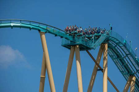Orlando, Florida. July 29, 2019. People having fun terrific Kraken rollercoaster at Seaworld 3のeditorial素材