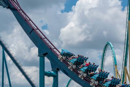 Orlando, Florida. July 29, 2019. People screaming, laughing and enjoying Mako rollercoaster at Seaworld 2のeditorial素材