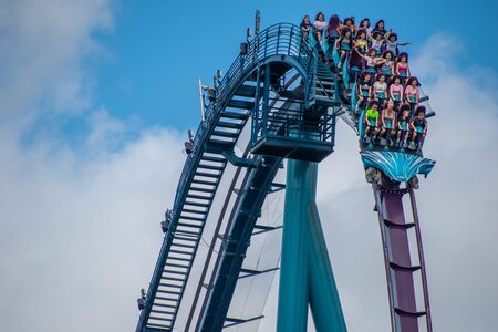 Orlando, Florida. July 29, 2019. People screaming, laughing and enjoying Mako rollercoaster at Seaworld 21のeditorial素材