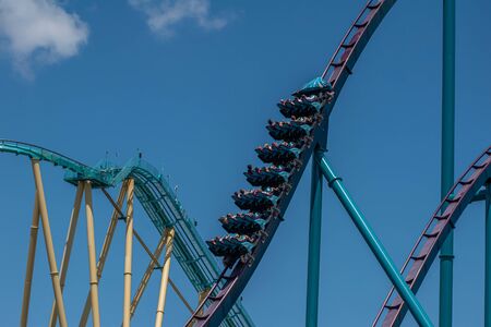 Orlando, Florida. July 29, 2019. People screaming, laughing and enjoying Mako rollercoaster at Seaworld 57のeditorial素材