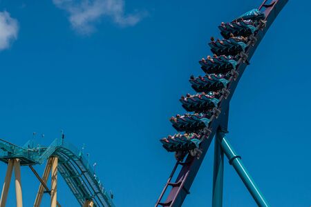 Orlando, Florida. July 29, 2019. People screaming, laughing and enjoying Mako rollercoaster at Seaworld 58のeditorial素材