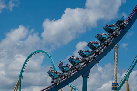 Orlando, Florida . July 29, 2019. People enjoying riding Mako rollercoaster during summer vacation at Seaworld 76のeditorial素材