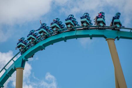Orlando, Florida. July 29, 2019. People enjoying riding Kraken rollercoaster during summer vacation at Seaworld 43のeditorial素材