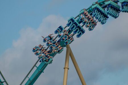 Orlando, Florida. July 29, 2019. People having fun Kraken rollercoaster during summer vacation at Seaworld 2のeditorial素材