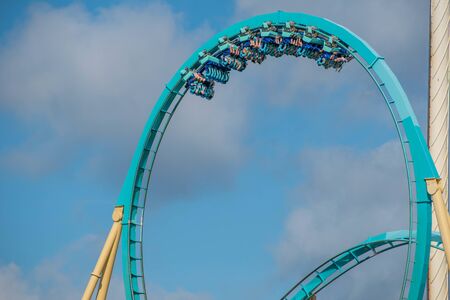 Orlando, Florida. July 29, 2019. People having fun Kraken rollercoaster at Seaworld 22のeditorial素材