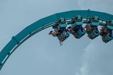 Orlando, Florida. July 26, 2019. People having fun Kraken rollercoaster during summer vacation at Seaworld 11のeditorial素材