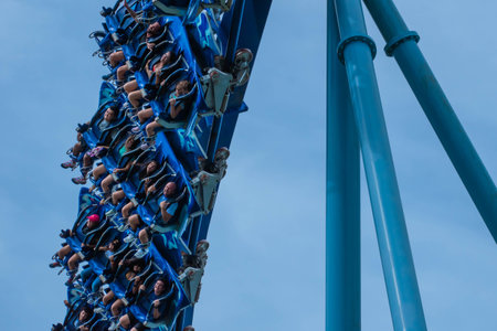 Orlando, Florida. July 26, 2019. People screaming, laughing and enjoying Manta Ray rollercoaster at...