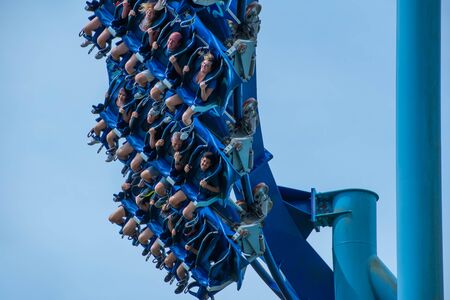 Orlando, Florida. July 26, 2019. People screaming, laughing and enjoying Manta Ray rollercoaster at Seaworld 7のeditorial素材