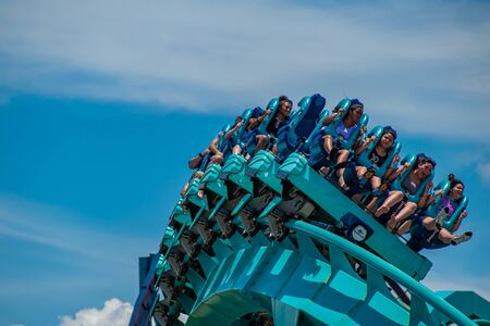 Orlando, Florida . July 31, 2019. People enjoying riding Kraken rollercoaster during summer vacation at Seaworld 34のeditorial素材