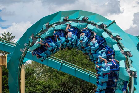 Orlando, Florida . July 31, 2019. People enjoying amazing Kraken rollercoaster during summer vacation at Seaworld 1のeditorial素材