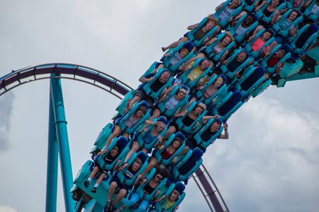 Orlando, Florida. July 31, 2019. People having amazing fun Kraken rollercoaster at Seaworld 7のeditorial素材