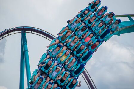 Orlando, Florida. July 31, 2019. People having fun amazing Kraken rollercoaster at Seaworld 8のeditorial素材