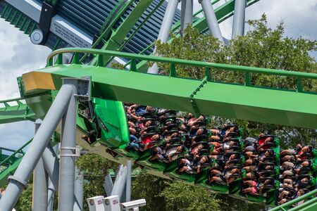 Orlando, Florida. August 07, 2019. People having terrific fun The Incredible Hulk rollercoaster, during summer vacation at Island of Adventure 2のeditorial素材