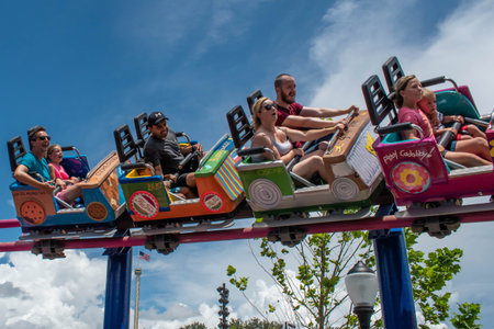 Orlando, Florida. August 07, 2019. People enjoying Super Grovers Box Car Derby. It is a family friendly rollercoaster in Sesame Street at Seaworld 1のeditorial素材