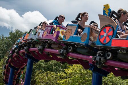 Orlando, Florida. August 07, 2019. People enjoying Super Grovers Box Car Derby. It is a family friendly rollercoaster in Sesame Street at Seaworld 20のeditorial素材
