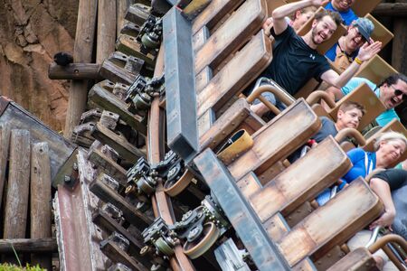Orlando, Florida. August 14, 2019. People having fun Expedition Everest rollercoaster during vacation summer, at Animal Kingdom (200)のeditorial素材
