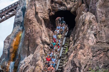 Orlando, Florida. August 14, 2019. People having fun terrific Expedition Everest rollercoaster at Animal Kingdom (44)のeditorial素材