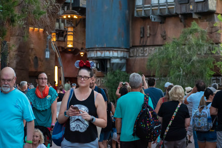 Orlando, Florida. September 27, 2019. Woman with ears of Minnie in Star Wars Galaxys Edge at...