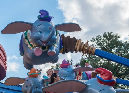 Orlando, Florida. September 23, 2019. People enjoying Dumbo the Flying Elephant at Magic Kigndom (3)のeditorial素材