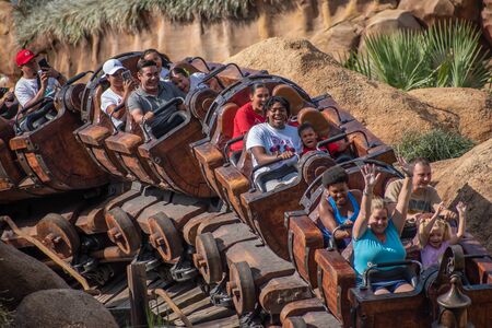Orlando, Florida. September 23, 2019. People enjoying Seven Dwarfs Mine Train rollercoaster at Magic Kigndom (5)のeditorial素材