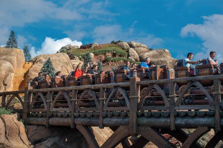 Orlando, Florida. September 23, 2019. People enjoying Seven Dwarfs Mine Train rollercoaster at Magic Kigndom (12)のeditorial素材