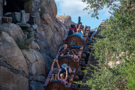 Orlando, Florida. September 23, 2019. People having fun Seven Dwarfs Mine Train at Magic Kigndom...