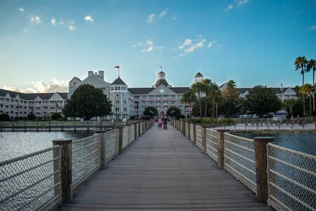 Orlando, Florida. October 11, 2019. People walking on pier and panoramic view of villas at Lake Buena Vista 96のeditorial素材