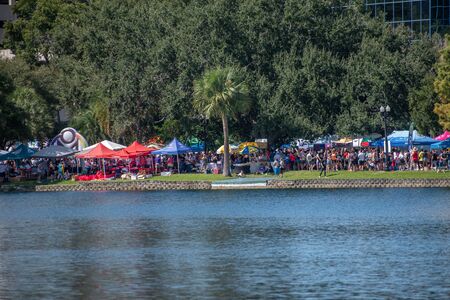 Orlando, Florida. October 12, 2019. Colorful stands in dock side on Come Out With Pride Orlando parade at Lake Eola Park area in downtown area 2のeditorial素材