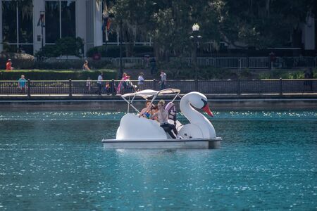 Orlando, Florida. October 12, 2019. Girls enjoying swan boat at Lake Eolar Park 2のeditorial素材