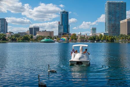 Orlando, Florida. October 12, 2019. Swan boats and swan at Lake Eola Park in downtown area 33のeditorial素材