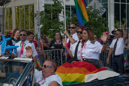 Orlando, Florida. October 12, 2019. LGBT Aviation Community car in Come Out With Pride Orlando stops...