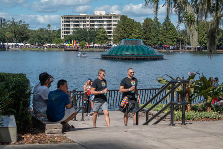Orlando, Florida. October 12, 2019. Mans walking in Come Out With Pride Orlando parade at Lake Eola...