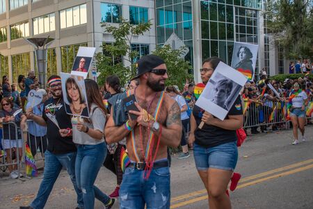 Orlando, Florida. October 12, 2019. Nice colorful people in Come Out With Pride Orlando parade at Lake Eola Park area 86のeditorial素材