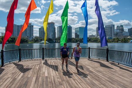 Orlando, Florida. October 12, 2019. Nice friends and colorful flags in Come Out With Pride Orlando parade at Lake Eola Park area 159のeditorial素材