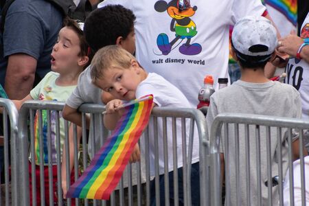 Orlando, Florida. October 12, 2019. Nice kid with rainbow flag in Come Out With Pride Orlando parade at Lake Eola Park area 229のeditorial素材