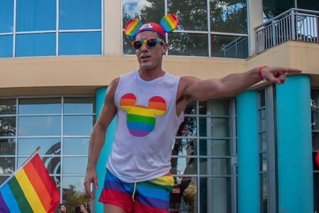 Orlando, Florida. October 12, 2019. Nice man of Disney Gay Community in Come Out With Pride Orlando stops at Lake Eola Park area 90のeditorial素材