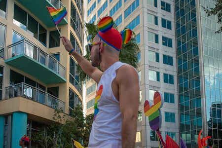 Orlando, Florida. October 12, 2019. Nice man of Disney Gay Community in Come Out With Pride Orlando stops at Lake Eola Park area 91のeditorial素材