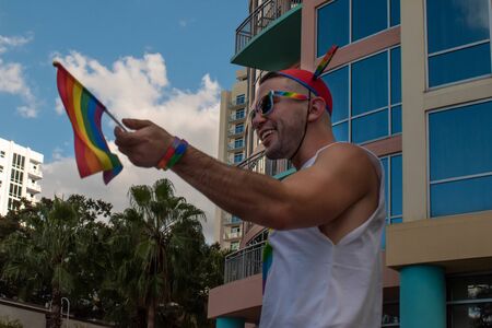 Orlando, Florida. October 12, 2019. Nice man of Disney Gay Community in Come Out With Pride Orlando stops at Lake Eola Park area 92のeditorial素材