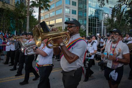 Orlando, Florida. October 12, 2019. Tampa Bay Pride Band in Come Out With Pride Orlando stops at Lake Eola Park area 19のeditorial素材